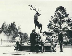 The often-photographed Elk Fountain was designed and made by J.W. Fiske of New York City. The eight drinking posts surrounding the elongated octagonal basin were each 4-feet 2-inches high. The basin itself measured nearly 12 by 15 feet. Supporting the elk was a base of iron, painted black. At each end was a lion's head which carried overflow from the filtering arrangement. The elk, described as standing in a defiant attitude, was painted in "the natural colors of the animal".